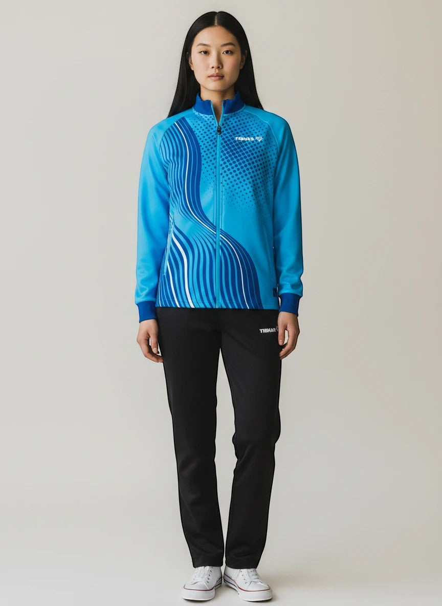 TTM-Store women's turquoise polyester-elastane training suit with abstract wave design on jacket.