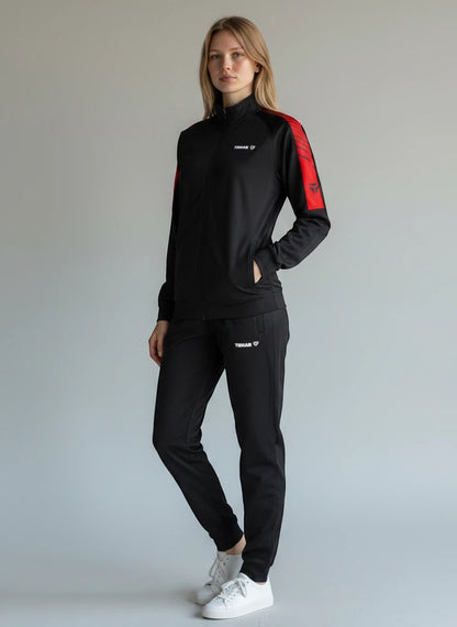 TTM-Store black and red polyester-elastane training suit with zip-up jacket and trousers. Features red stripe detail on sleeves.