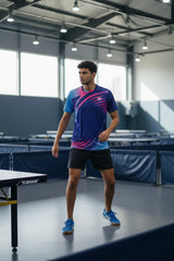 TTM-Store Tibhar Heaven men's blue and pink short-sleeve t-shirt with V-neck, made of polyester and elastane for table tennis.