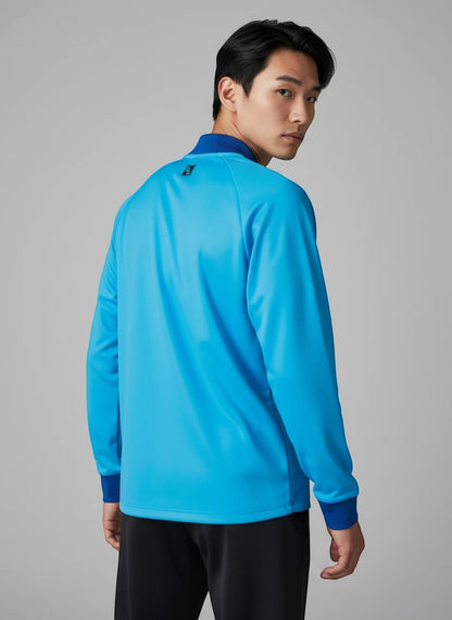 TTM-Store Tibhar L2 River training suit in turquoise, made of polyester and elastane, with a comfortable fit and zippered pockets.