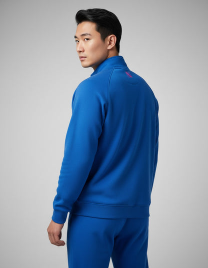 TTM-Store royal blue and pink Tibhar L2 Underbrush training suit with jacket and pants, made of soft functional material.