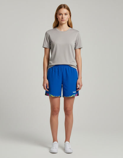 TTM-Store Tibhar L2 Underbrush royal blue polyester shorts with pink accents and abstract hem detail.
